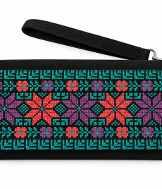 Hand-embroidered clutch with alternating large eight-point star-like motifs with small floral details and teal borders, shown on a white background with a wrist strap.